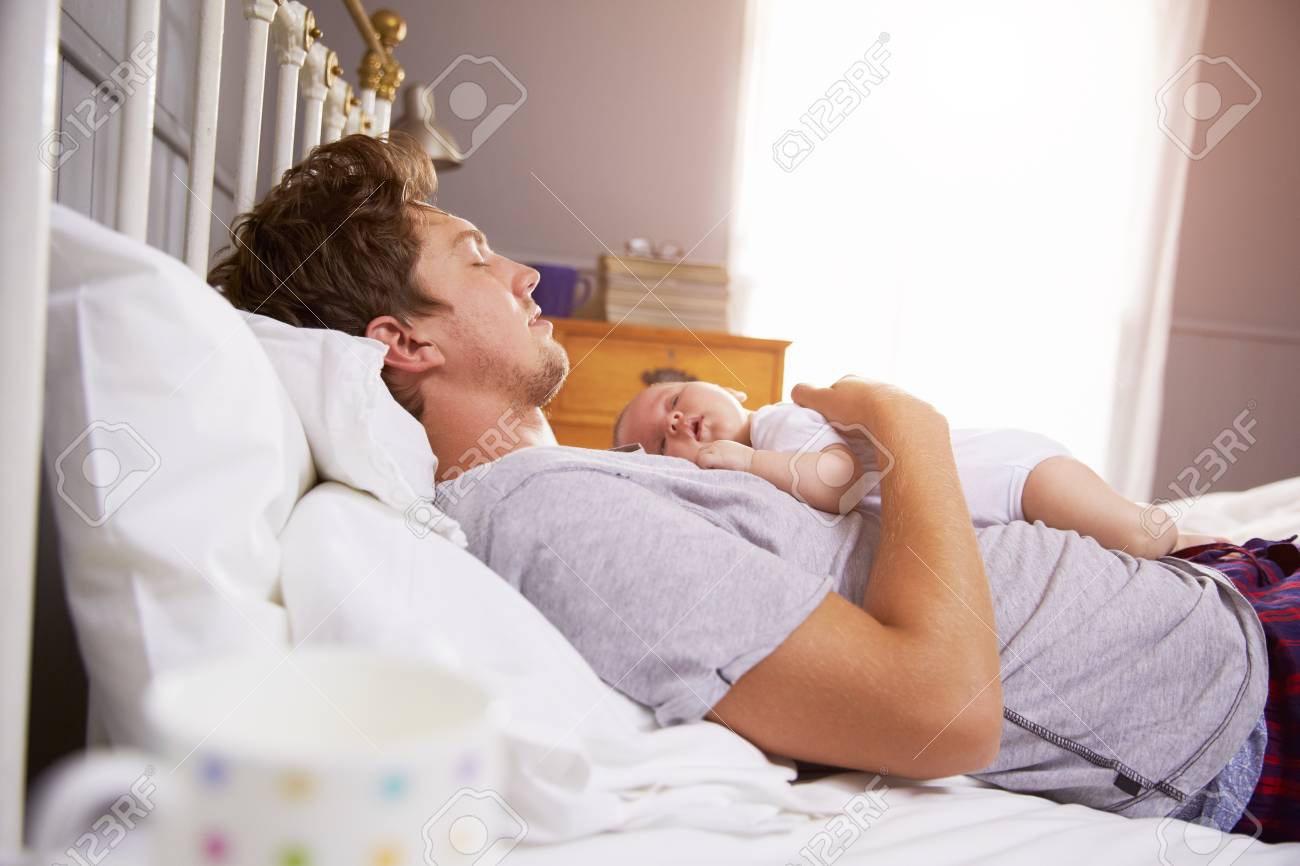 baby holding bed