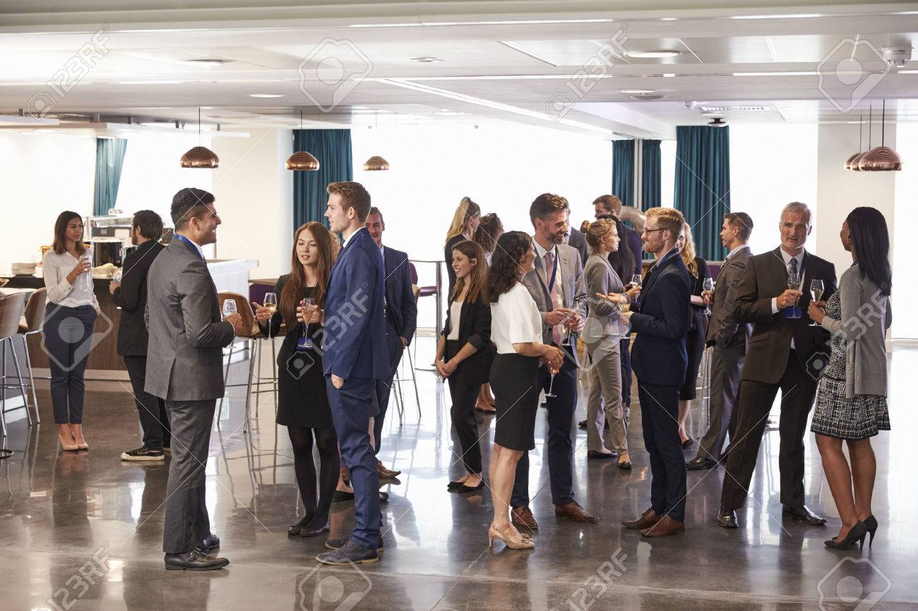 Delegates Networking At Conference Drinks Reception - 71235878 Delegates Networking At Conference Drinks Reception - 71235878