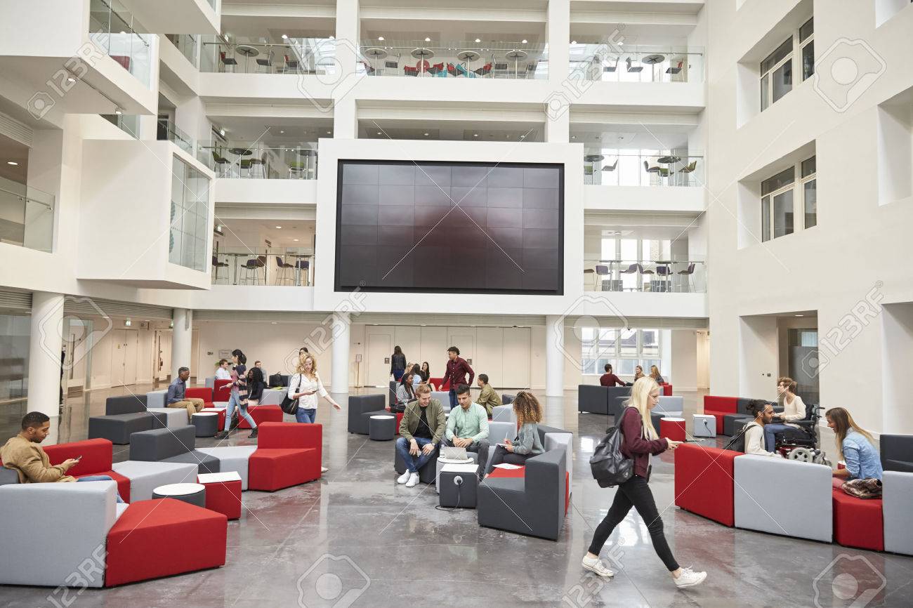 Students In Front Of Screen In Atrium Of Modern University Stock ... Students In Front Of Screen In Atrium Of Modern University Stock ...