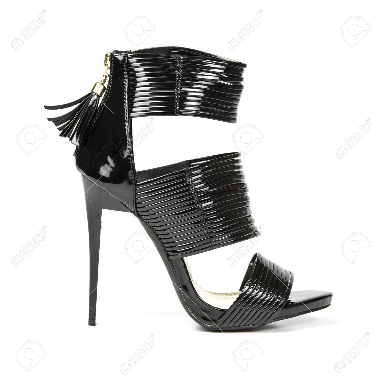 Fetish style high heels shoes with ankle straps in shiny black.. Fetish style high heels shoes with ankle straps in shiny black..