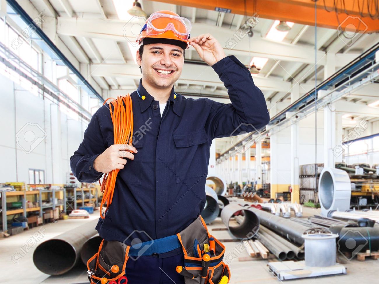 portrait of an happy worker in a factory stock photo picture and worker stock