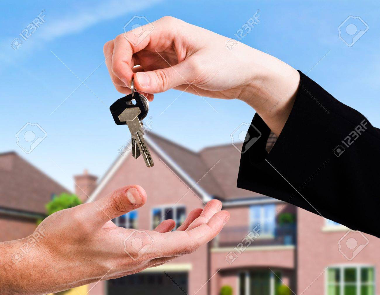 Hand Passing A Set Of Keys To Another Hand Stock Photo, Picture And Royalty  Free Image. Image 15665084.