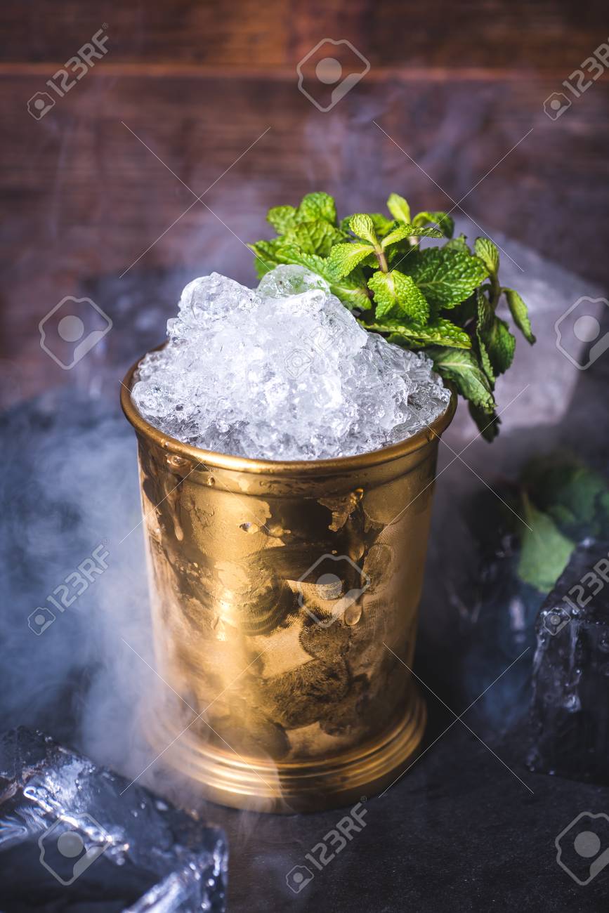 Crushed ice in a tin can on the table. - 92863988 Crushed ice in a tin can on the table. - 92863988