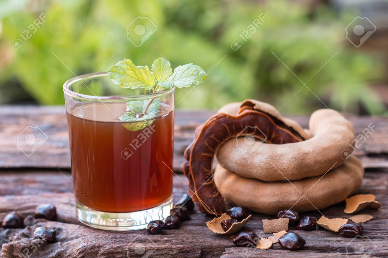 タマリンド ジュース 甘い飲み物は美味しいタマリンド 熟したタマリンド 素朴な木製のテーブルにミントの葉を持つ種 選択と集中とトーンのイメージ 領域をコピーします の写真素材 画像素材 Image タマリンド ジュース 甘い飲み物は美味しいタマリンド 熟したタマリンド 素朴な木製のテーブルにミントの葉を持つ種 選択と集中とトーンのイメージ 領域をコピーします の写真素材 画像素材 Image