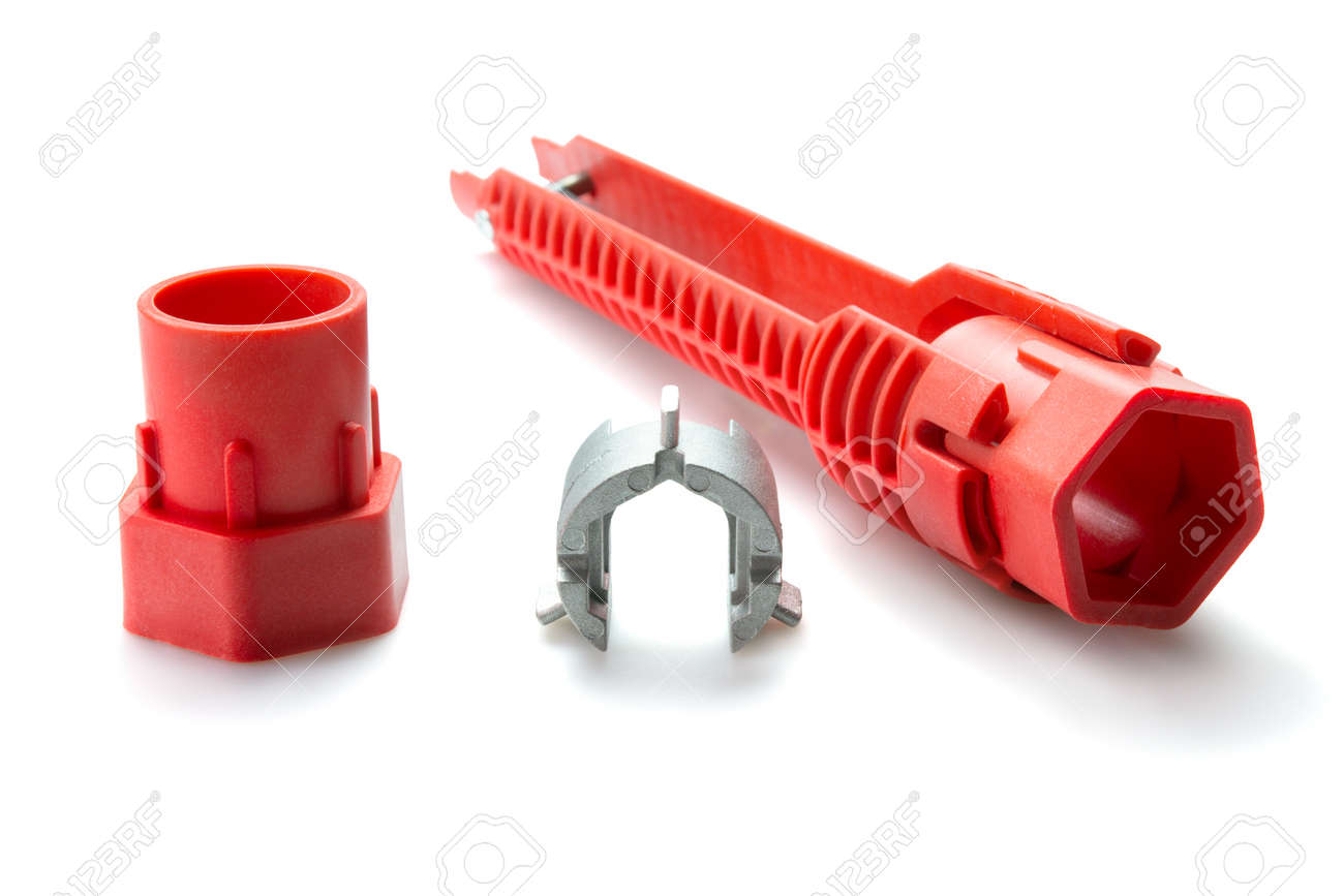 Pipe wrench, Tool for repair sink strainers over white background. Selective focus. - 166001295 Pipe wrench, Tool for repair sink strainers over white background. Selective focus. - 166001295