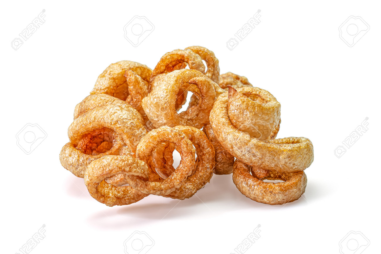 Pork snack or Pork rind leather lean pork fried crispy and blistered isolated on white background. Thai food, Close-up - 166001304 Pork snack or Pork rind leather lean pork fried crispy and blistered isolated on white background. Thai food, Close-up - 166001304