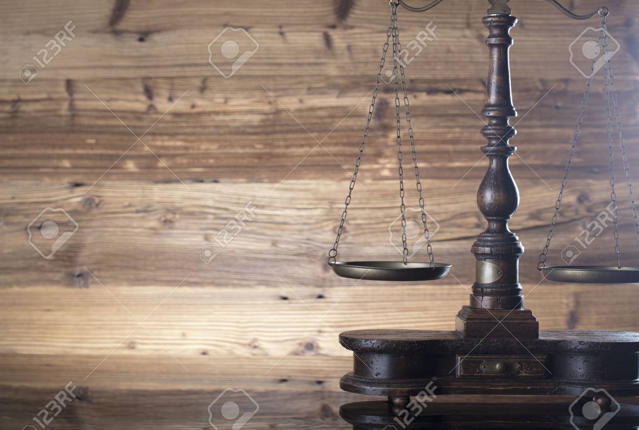 law theme scale of justice on wooden background stock photo wooden theme