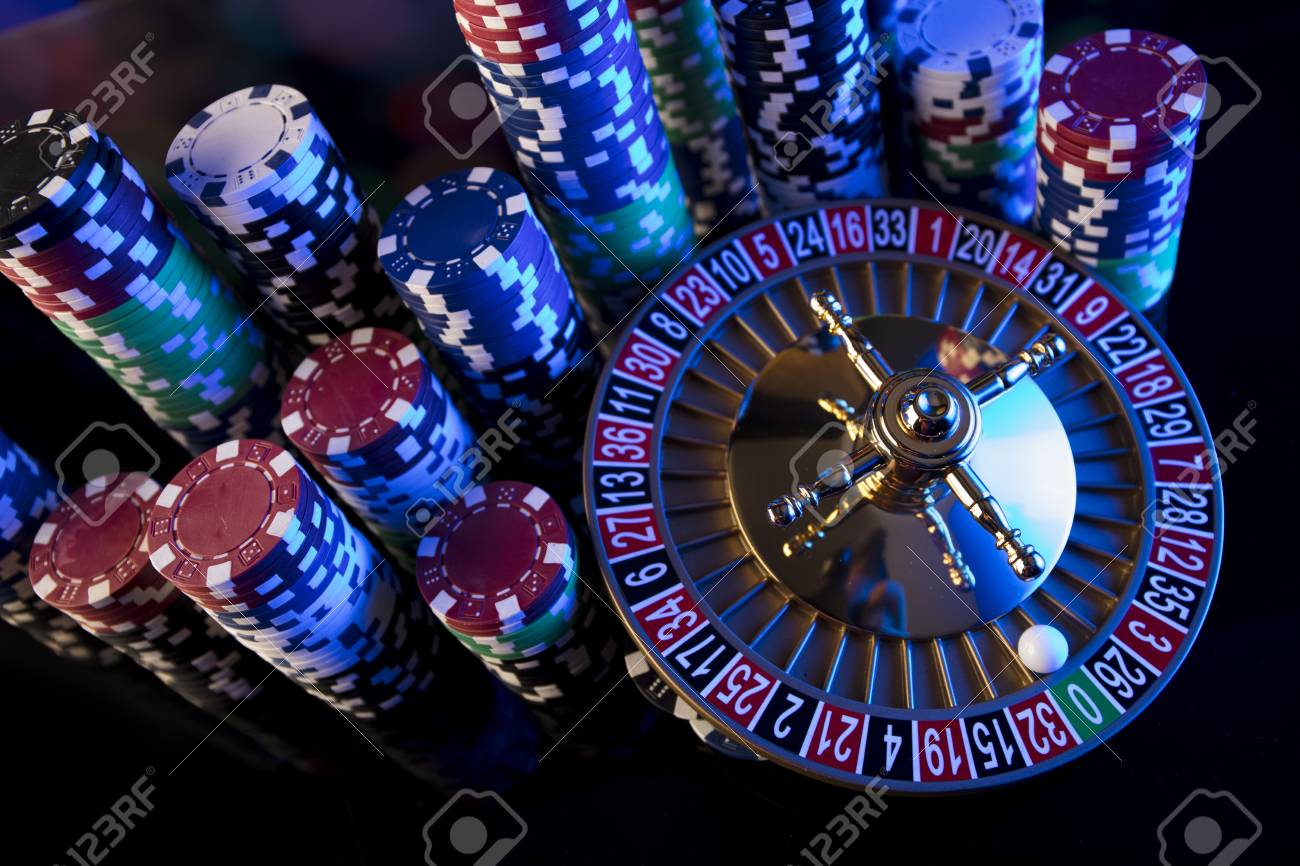Casino Blurred Background. Roulette And Stacks Of Chips. Stock Photo, Picture And Royalty Free Image. Image 81016243.