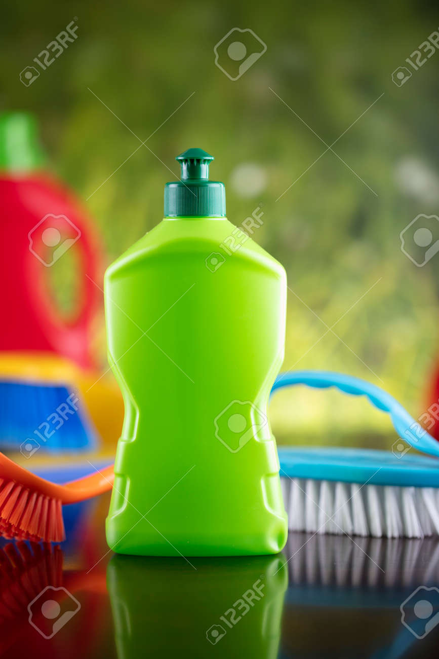 Spring house and office cleaning. Cleaning kit and sources on the glass table. Bokeh background. - 169346953 Spring house and office cleaning. Cleaning kit and sources on the glass table. Bokeh background. - 169346953