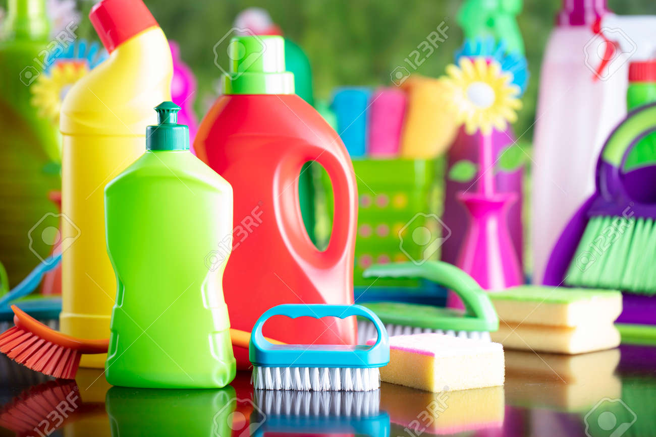 Spring house and office cleaning. Cleaning kit and sources on the glass table. Bokeh background. - 169346956 Spring house and office cleaning. Cleaning kit and sources on the glass table. Bokeh background. - 169346956