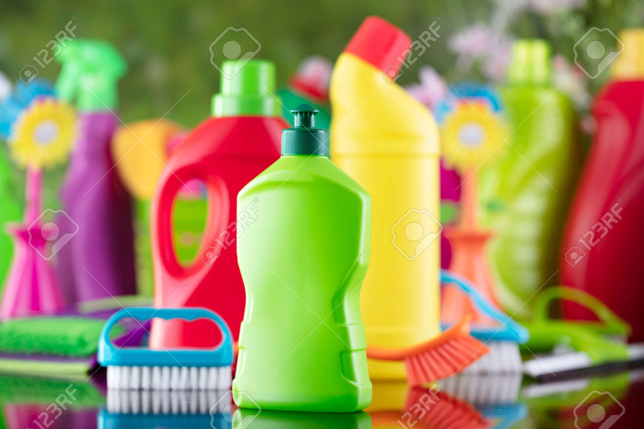 Spring house and office cleaning. Cleaning kit and sources on the glass table. Bokeh background. - 169346959 Spring house and office cleaning. Cleaning kit and sources on the glass table. Bokeh background. - 169346959