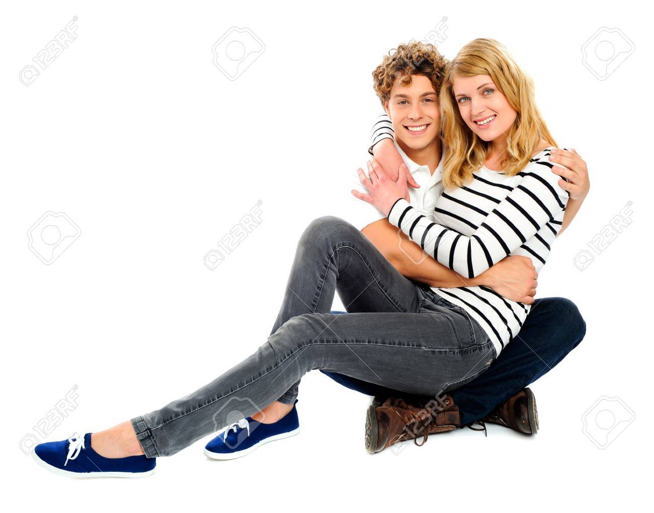 Girlfriend Sitting On Her Partners Lap Against A White Background Stock Photo Picture And Royalty Free Image Image
