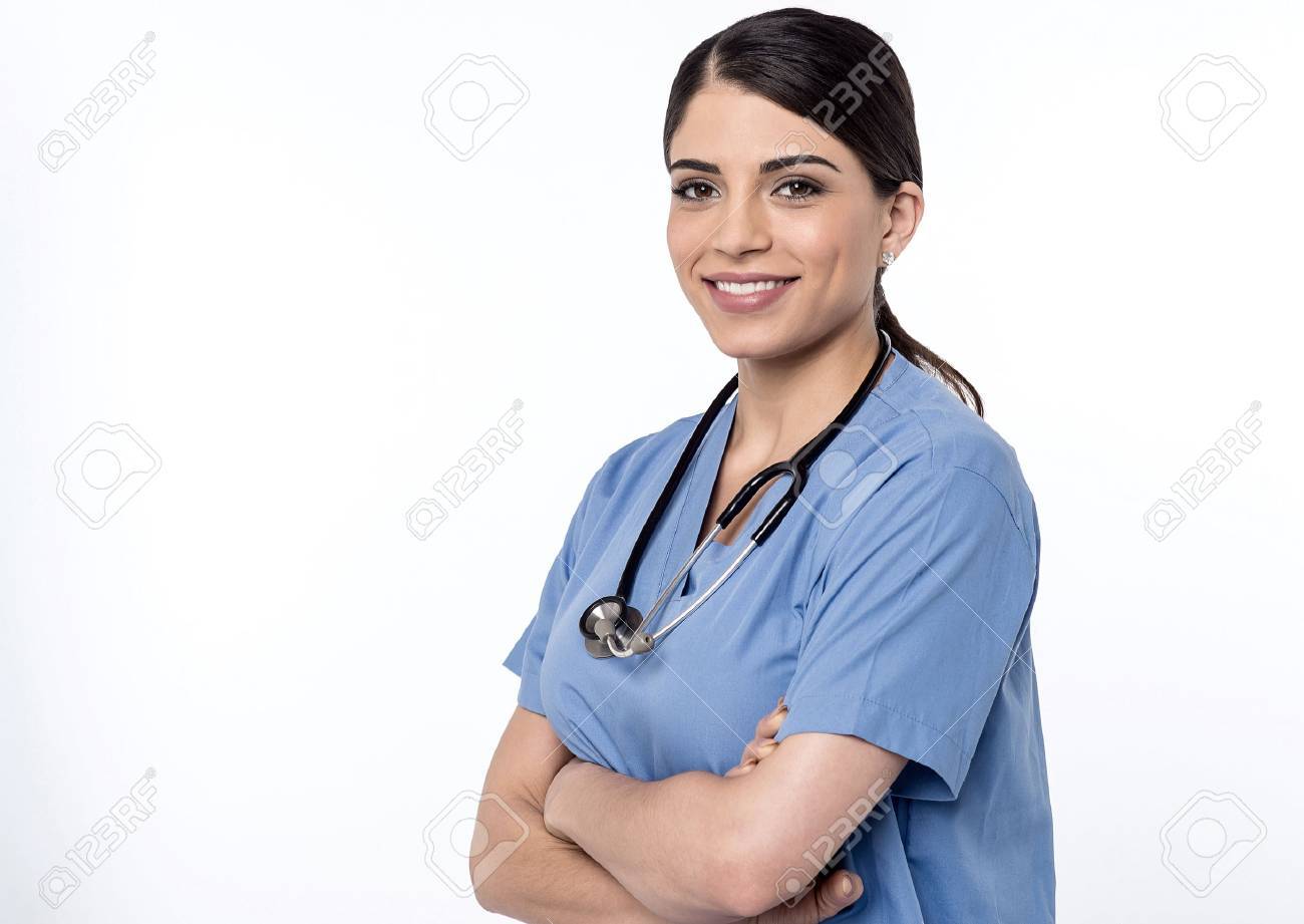 Smiling female doctor posing with arms crossed - 53426466 Smiling female doctor posing with arms crossed - 53426466