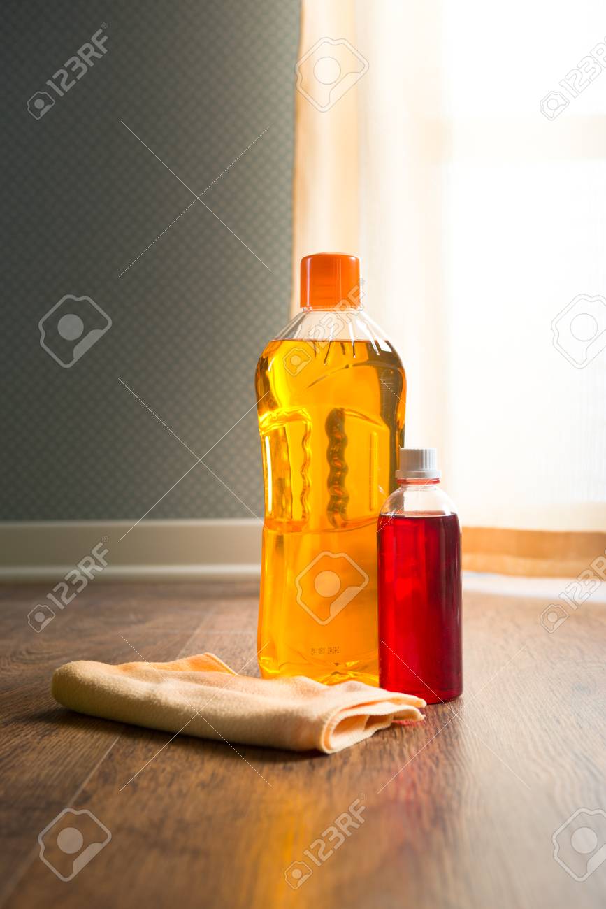 Hardwood Floor Mantainance Products On Parquet With Microfiber