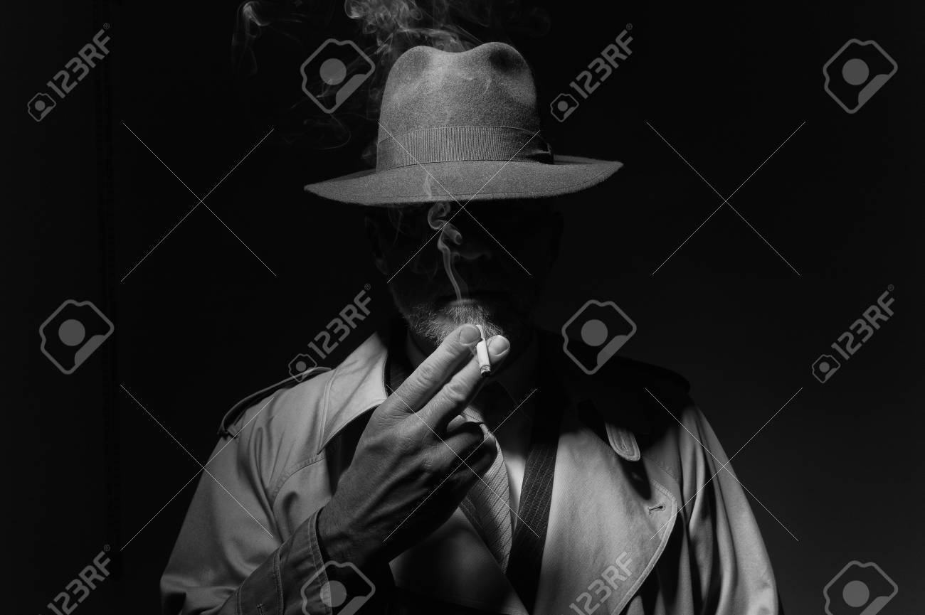 fedora hat and trench coat