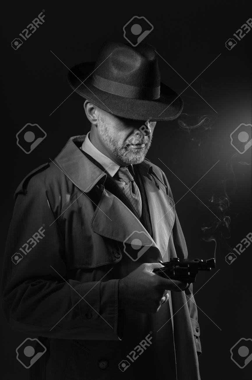 fedora hat and trench coat