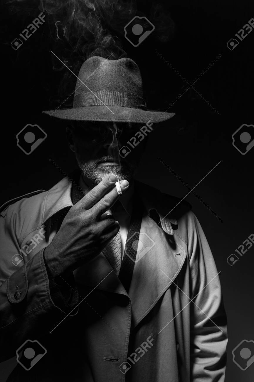 fedora hat and trench coat