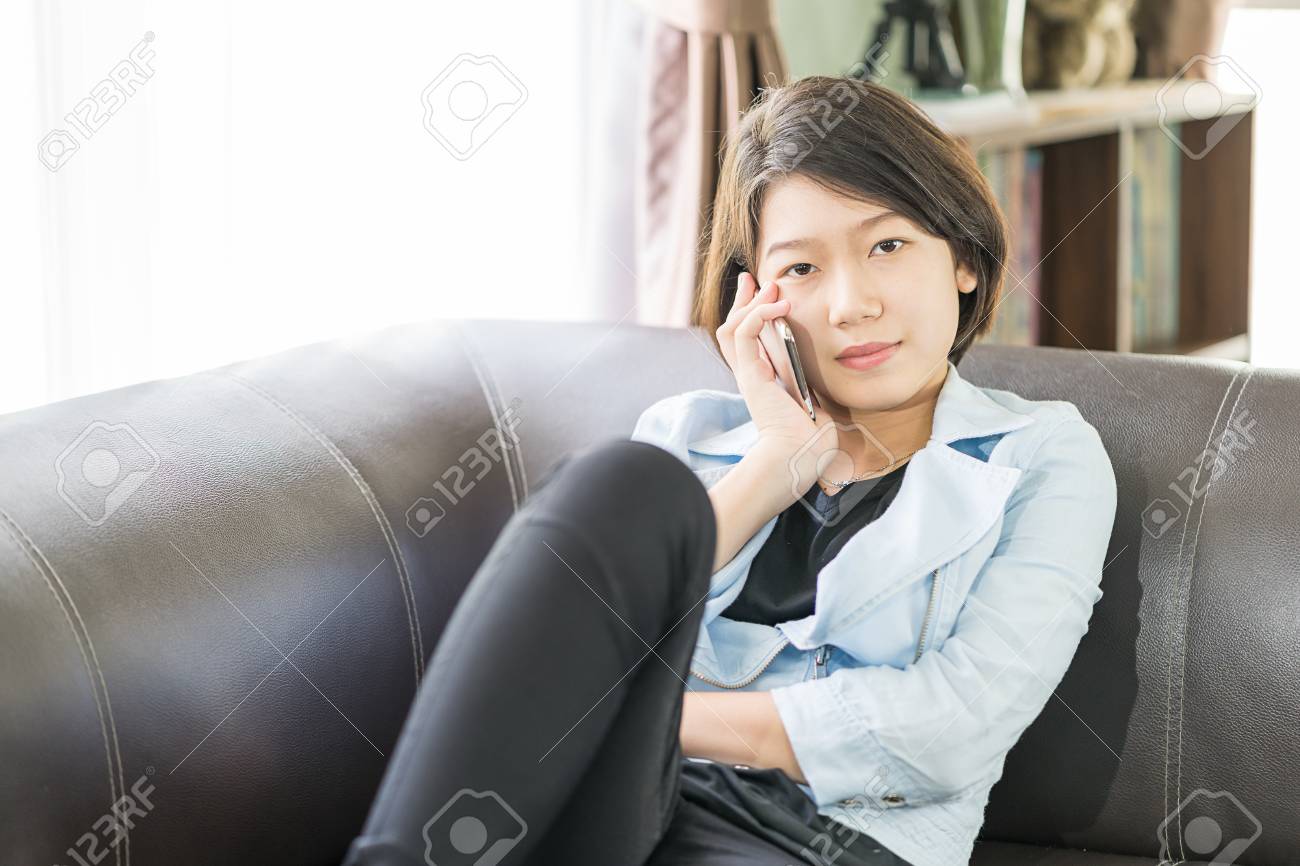 Close Up Young Asian Woman Short Hair Use Mobile Phone On The
