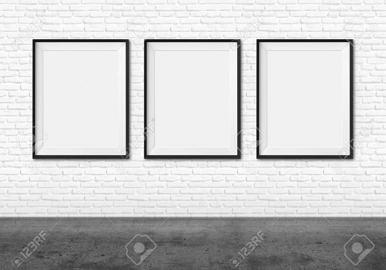Art gallery. Blank picture frames on brick wall background.