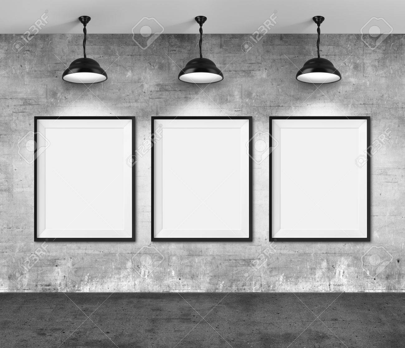Art gallery. Blank picture frames on grunge wall background.