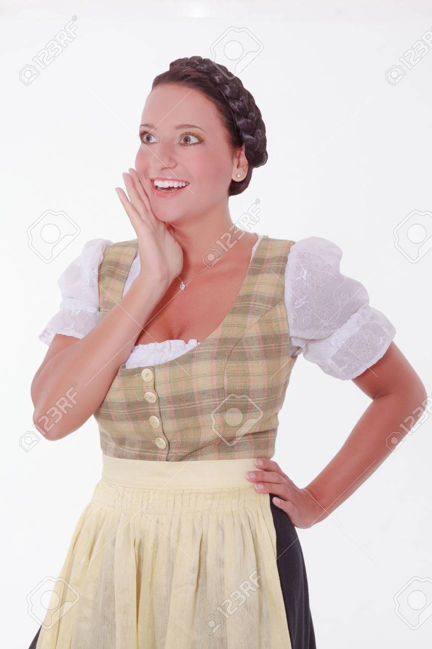 Laughing Young Bavarian Woman In Dirndl With Traditional Hairstyle