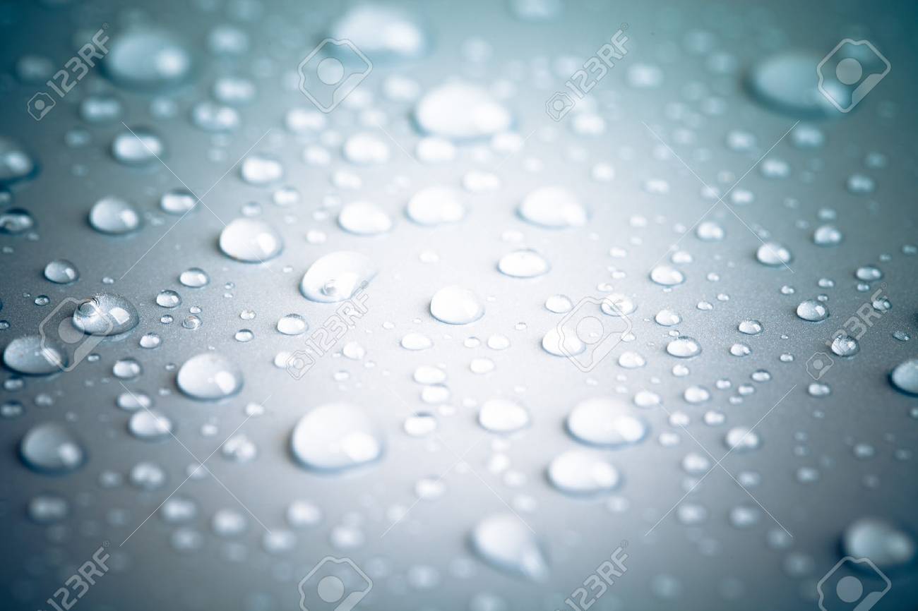 Drops of water on a color background. Shallow depth of field. Toned. - 37846657 Drops of water on a color background. Shallow depth of field. Toned. - 37846657