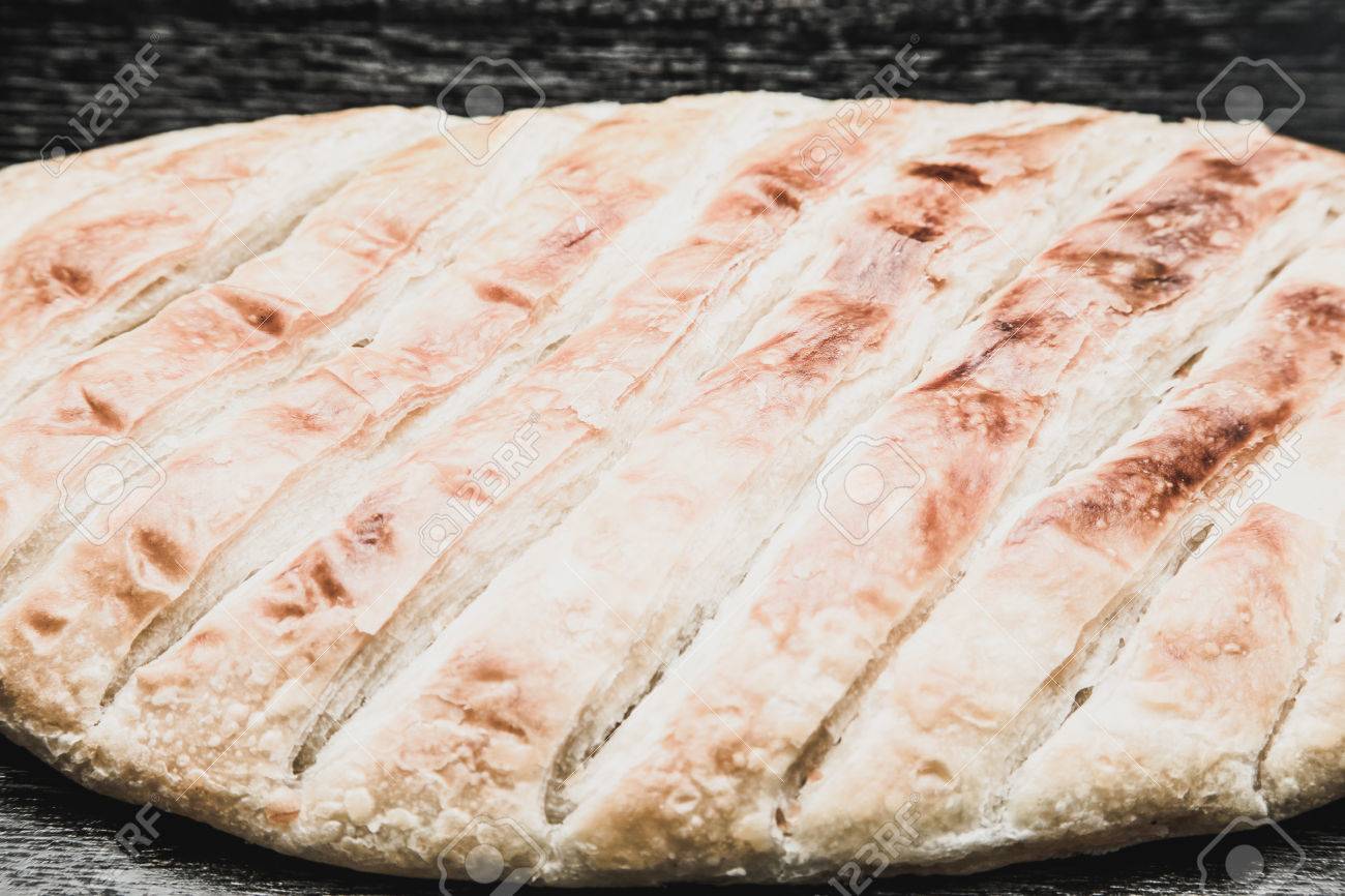 Immagini Stock Il Pane Turco Katmer Su Un Tavolo O Una Tavola Di Legno Nero Messa A Fuoco Selettiva Profondita Di Campo Messa A Fuoco Selettiva Tonica Image 48980596