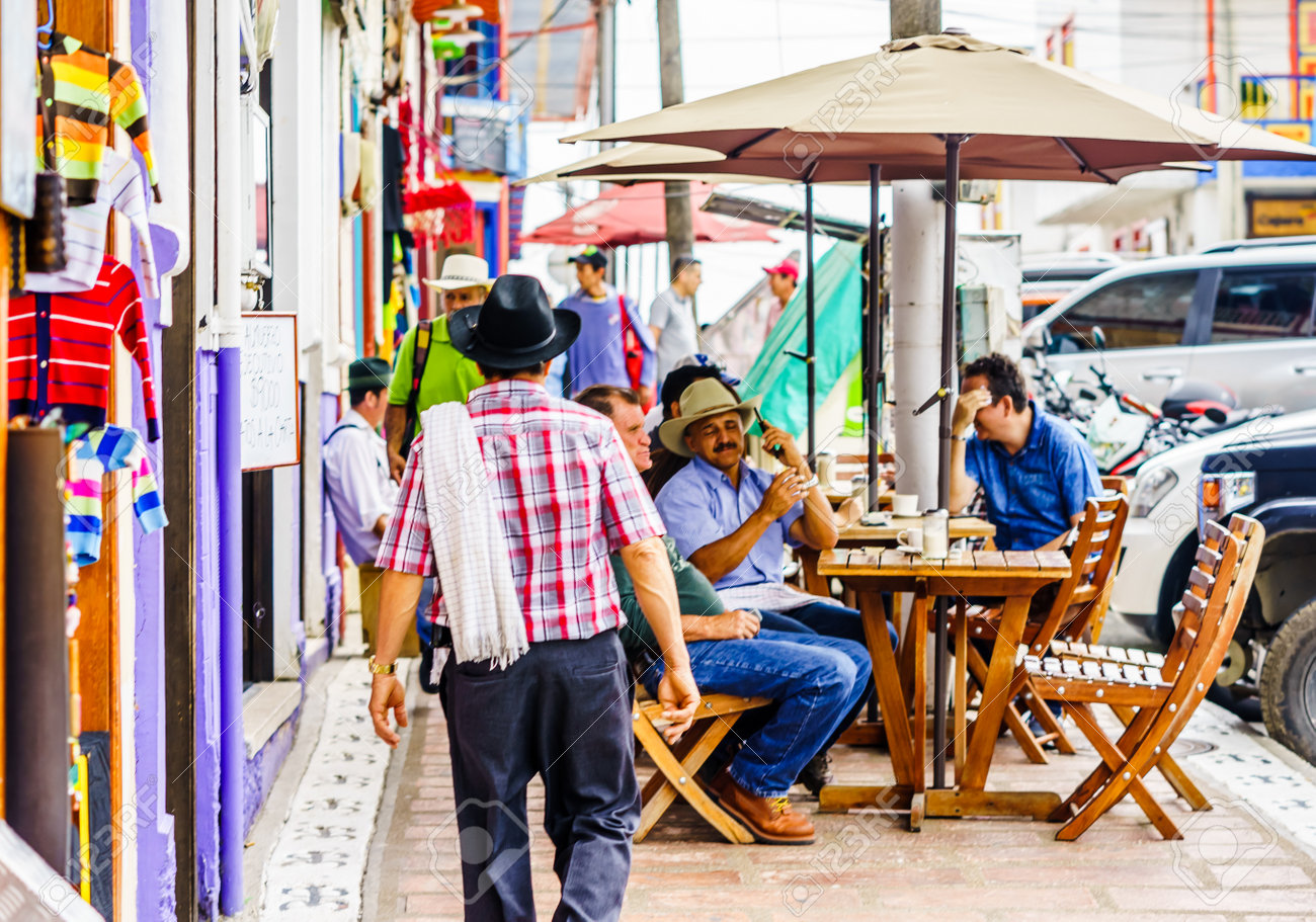 Filandia, Colombia on 23th March 2019: View on indignenous people in the streets of the village Filandia - 142308858 Filandia, Colombia on 23th March 2019: View on indignenous people in the streets of the village Filandia - 142308858
