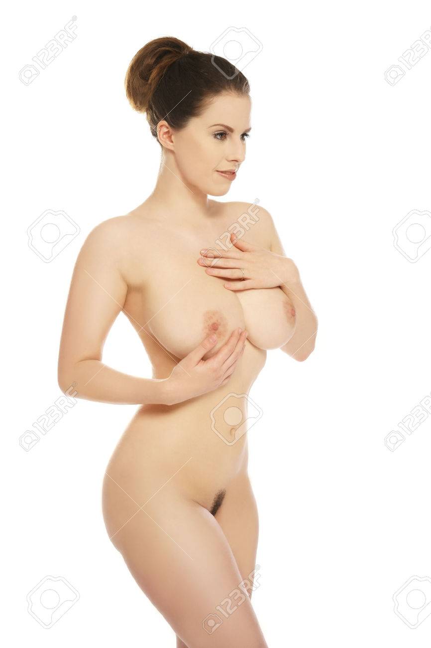 Voluptueuse Modèle Féminin Nu Souriant Avec Ses Mains Sur Sa Poitrine Sur  Fond Blanc Banque D'Images et Photos Libres De Droits. Image 69340061