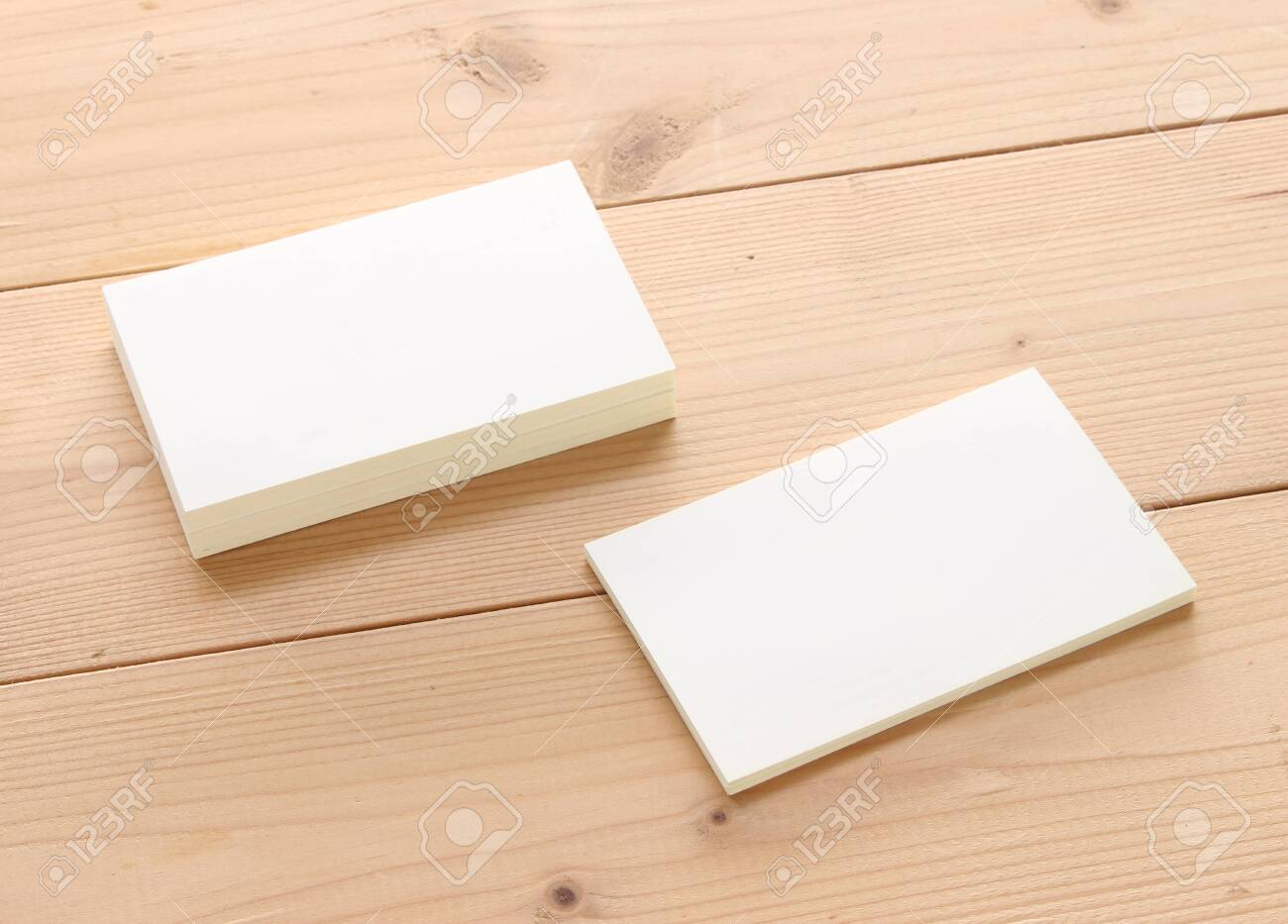 Mockup of business cards on wood textured background - 121950139 Mockup of business cards on wood textured background - 121950139