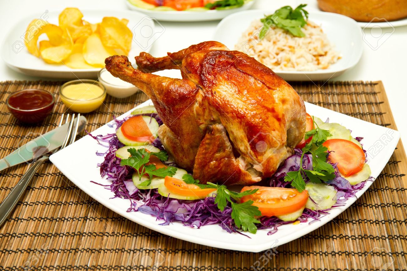 charcoal baked chicken and side dishes stock photo picture and
