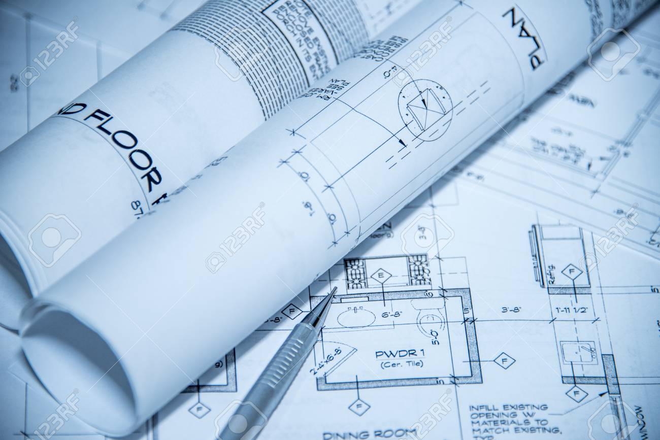 Blueprint Plans Rolled Up And Placed On A Few Other Blueprint Layouts  Alongside A Pencil Stock Photo, Picture and Royalty Free Image. Image  73527572.