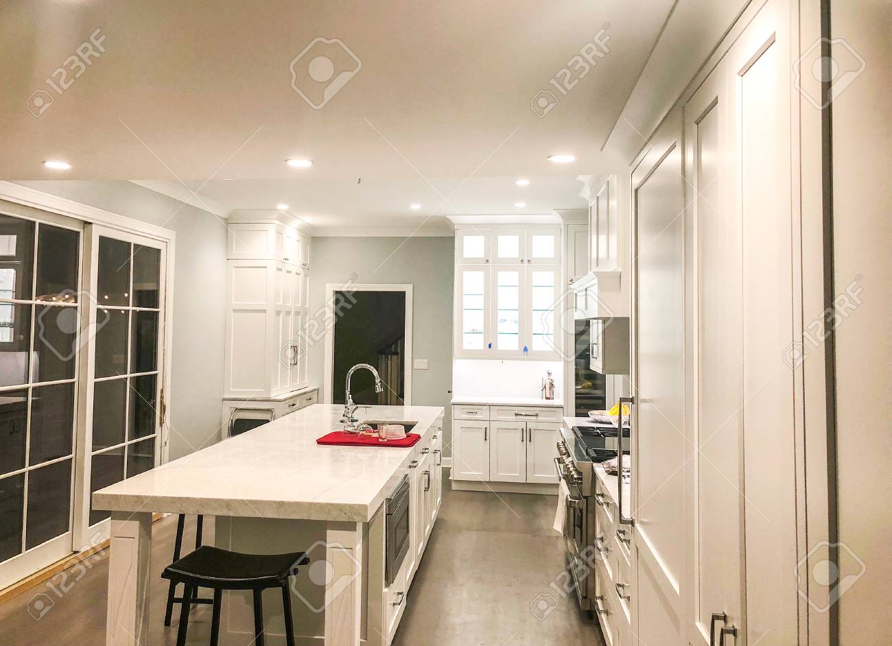 White Kitchen Cabinets With Island And Grranite Or Marble Counter