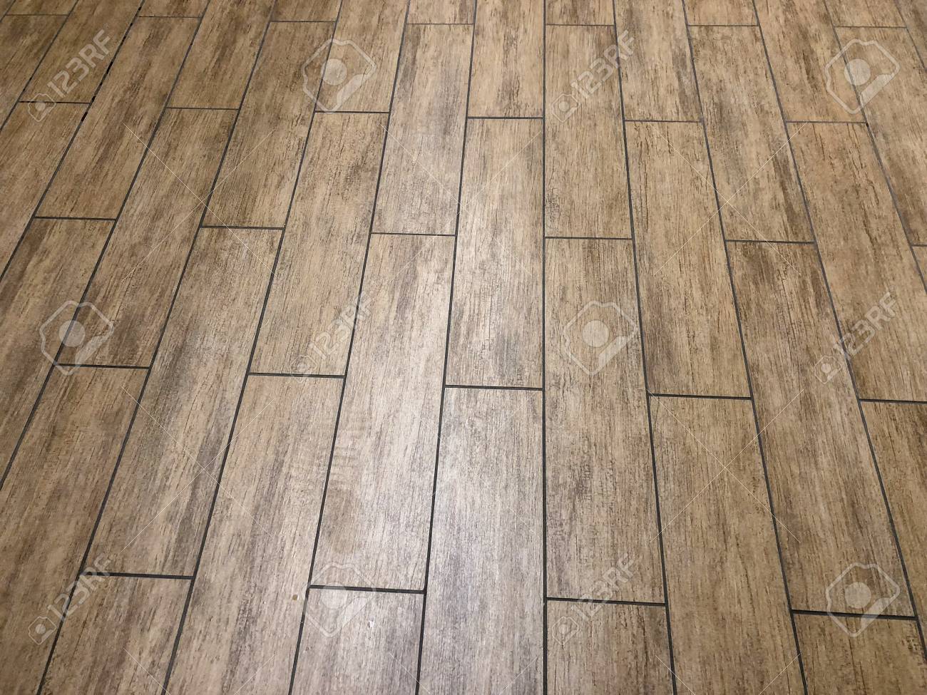 modern slate or ceramic long tiles installed in staggered pattern - 125499348 modern slate or ceramic long tiles installed in staggered pattern - 125499348