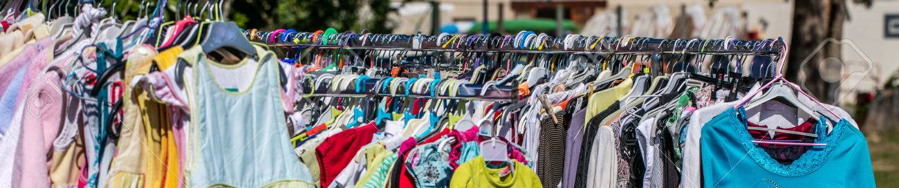 Alignment Of Second Hand Baby And Children Clothing Displayed