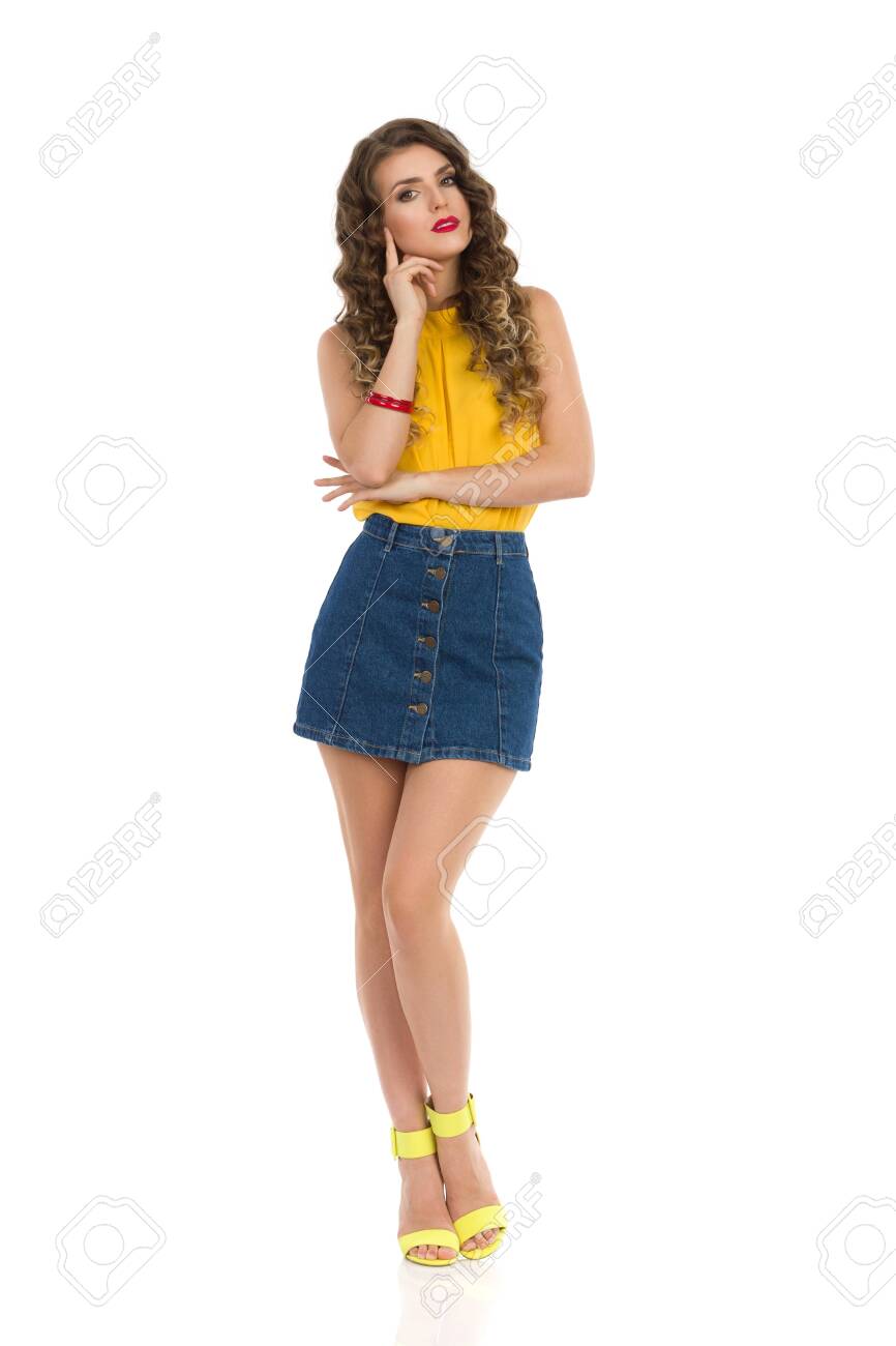 denim skirt and yellow top