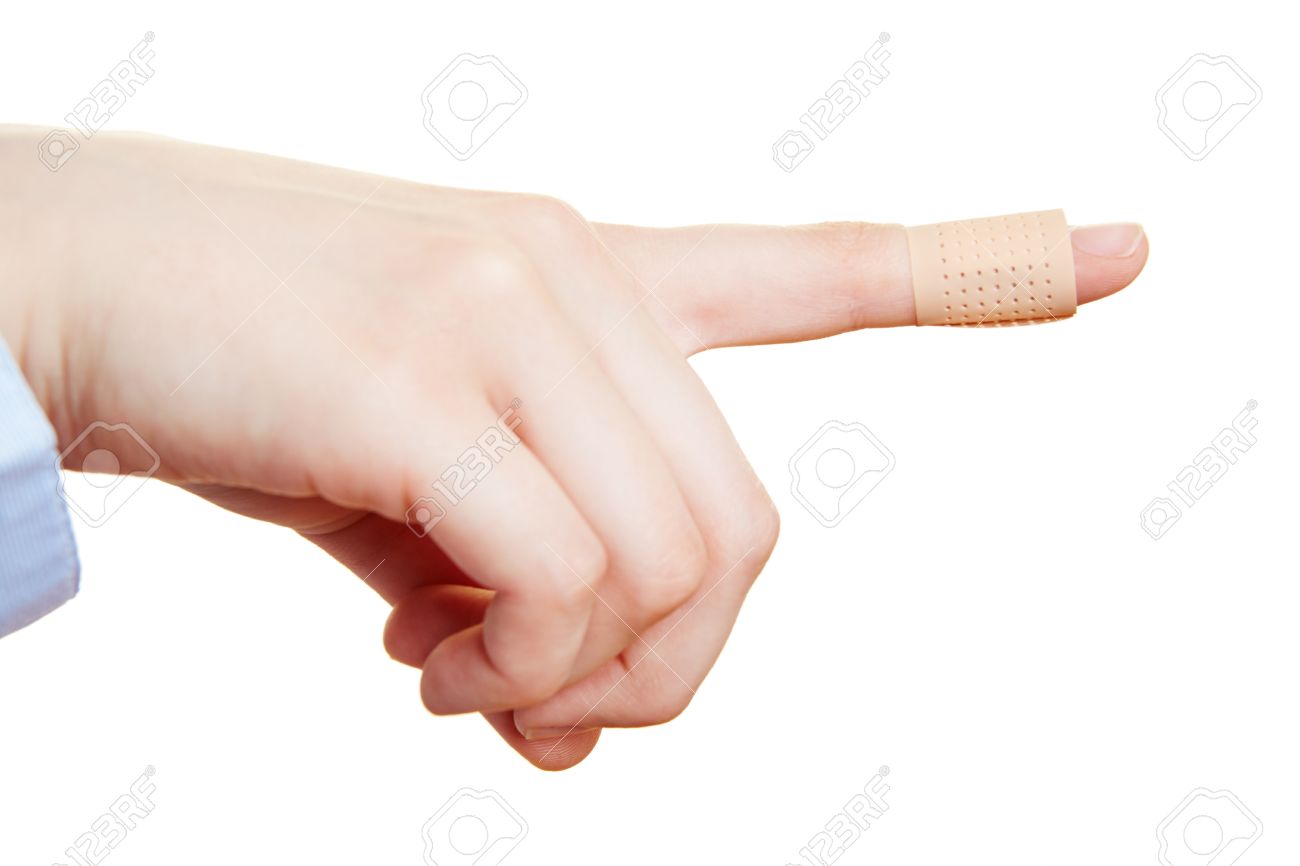 injured finger of a hand with a band aid stock photo picture and