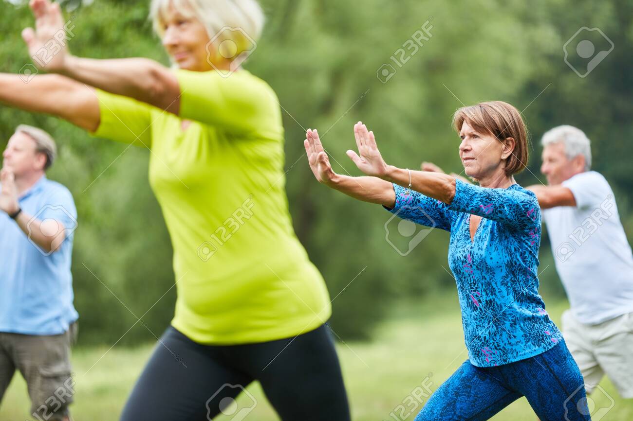 Seniors do Qi Gong or Tai Chi exercise for relaxation and health - 127705576 Seniors do Qi Gong or Tai Chi exercise for relaxation and health - 127705576