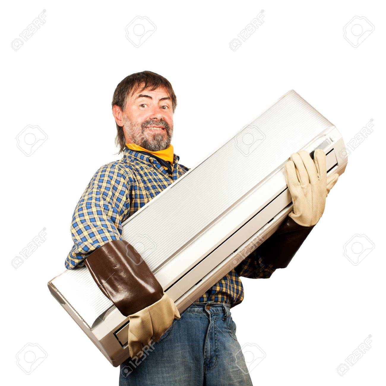 Air conditioning master holding in his arms new air conditioner and smiling Isolated on a white - 14748581 Air conditioning master holding in his arms new air conditioner and smiling Isolated on a white - 14748581