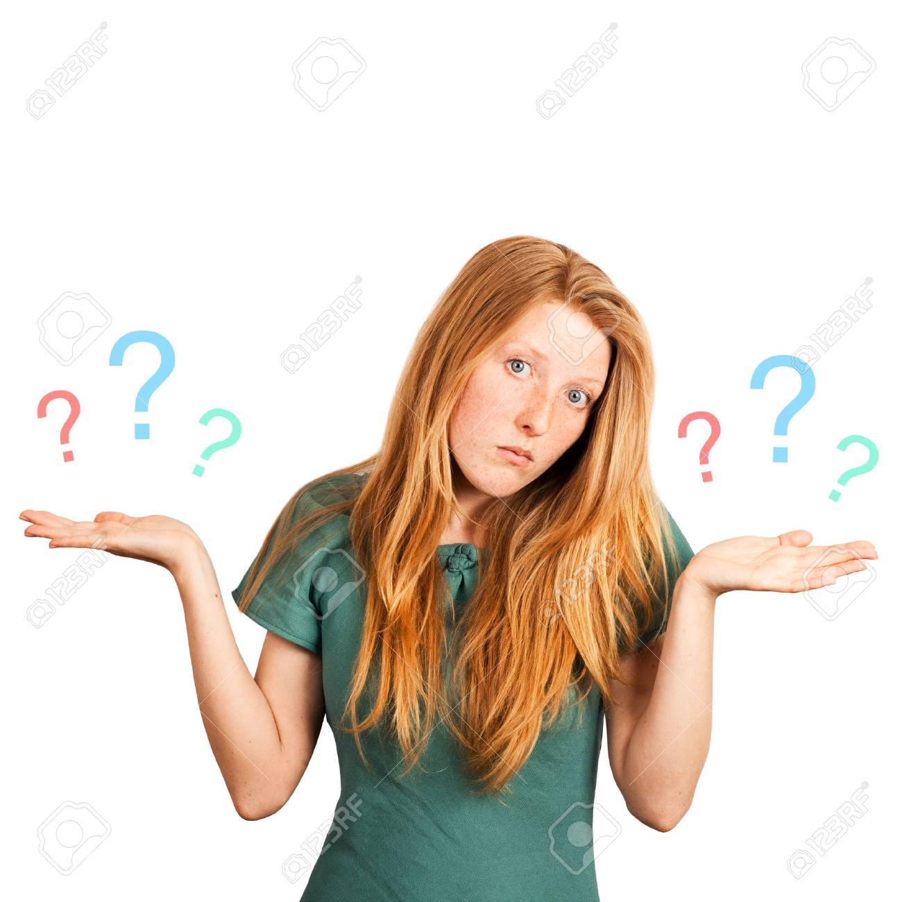 red-haired girl facing a choice isolated on a white, holding a questions marks at her hands. - 15564694 red-haired girl facing a choice isolated on a white, holding a questions marks at her hands. - 15564694