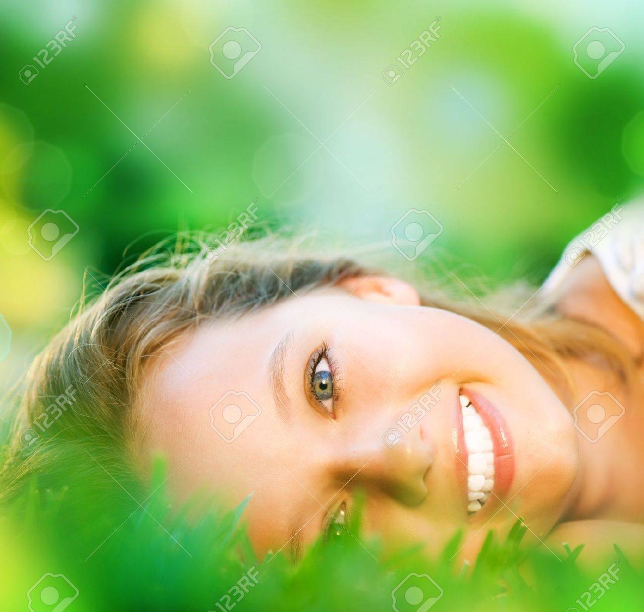 Spring Girl in Green Grass - 13549917 Spring Girl in Green Grass - 13549917