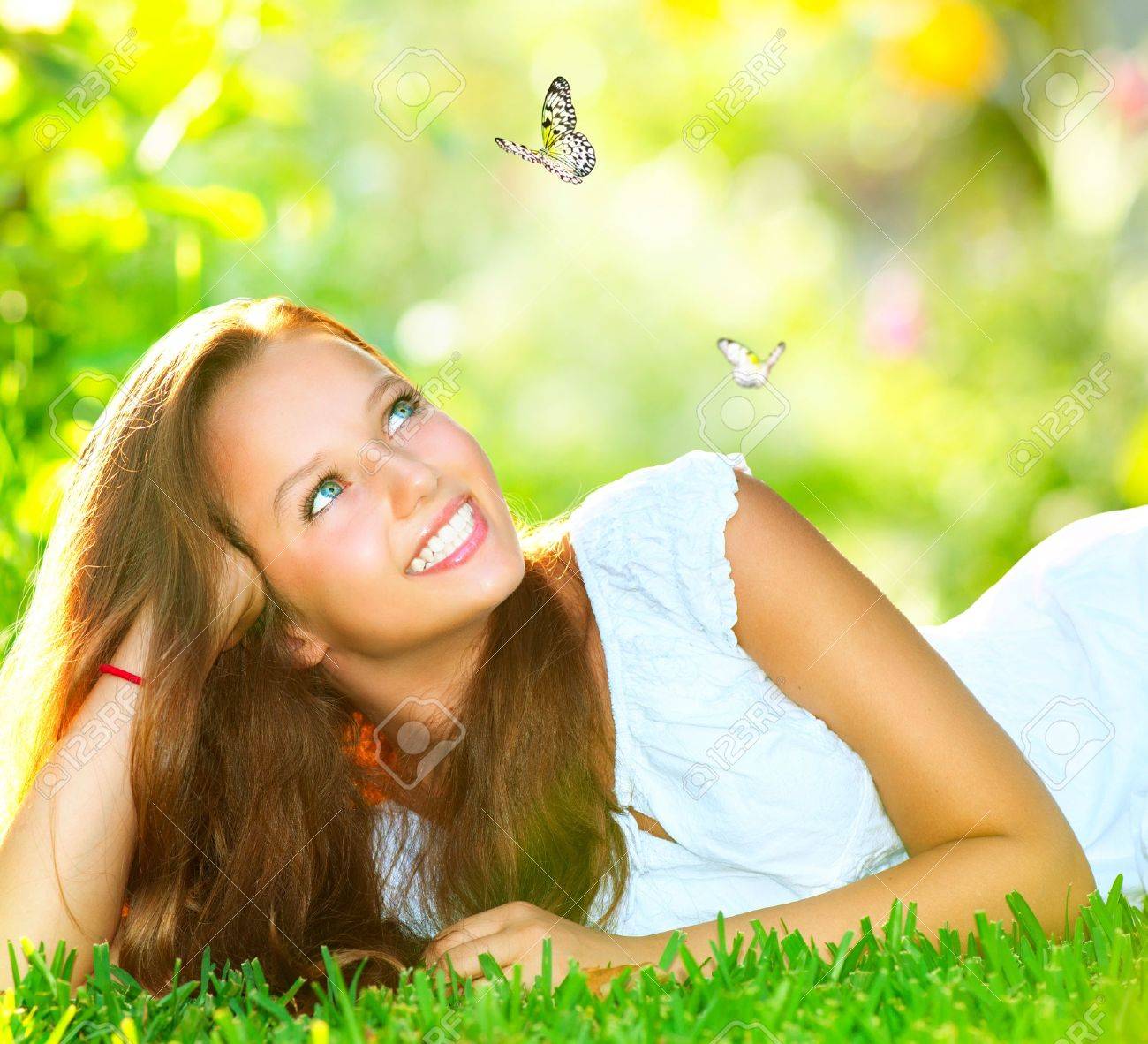 Spring Beauty Beautiful Girl Lying on Green Grass outdoor - 17771906 Spring Beauty Beautiful Girl Lying on Green Grass outdoor - 17771906