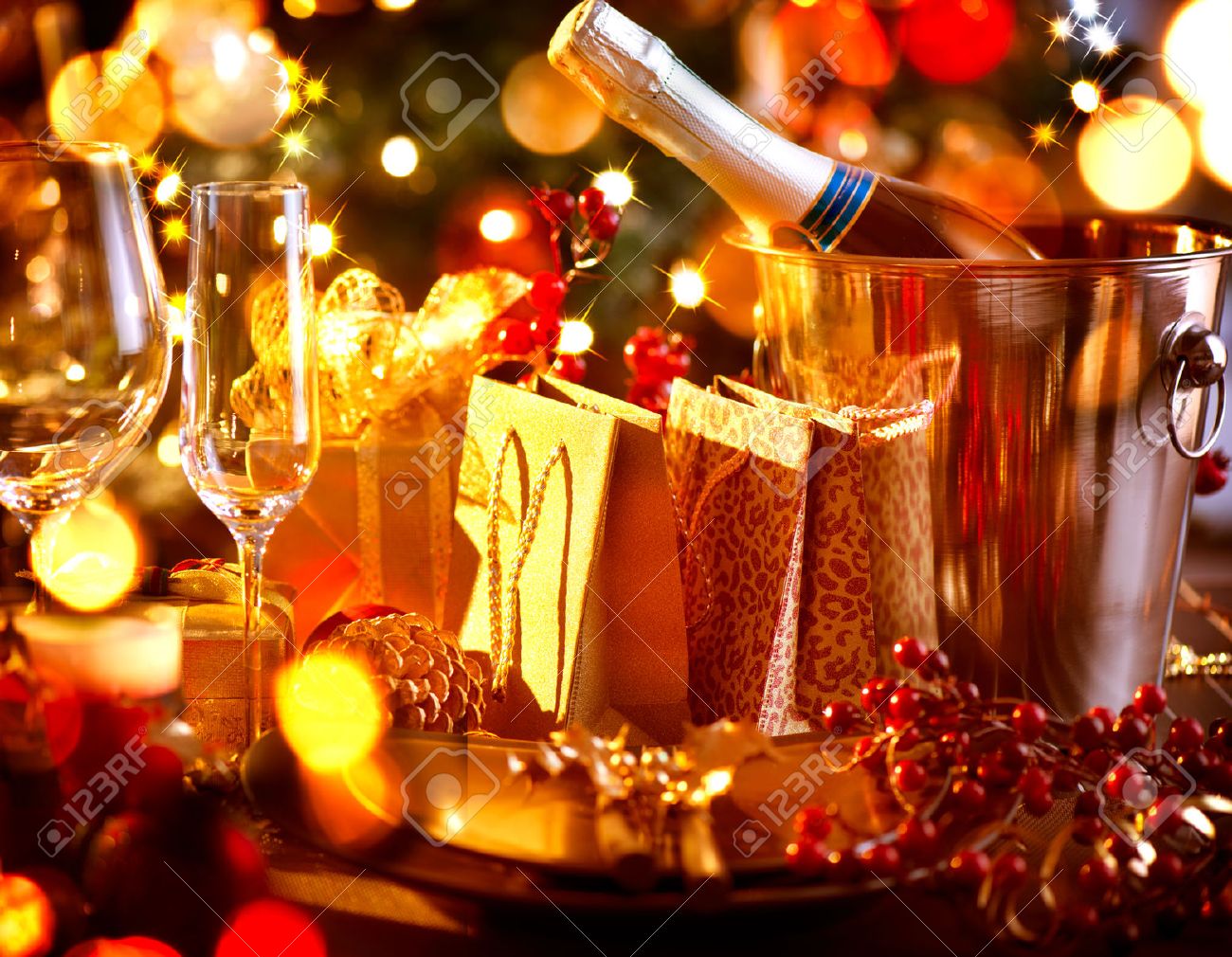 Holiday Table Settings christmas and new year holiday table setting with champagne stock Holiday Table Settings christmas and new year holiday table setting with champagne stock