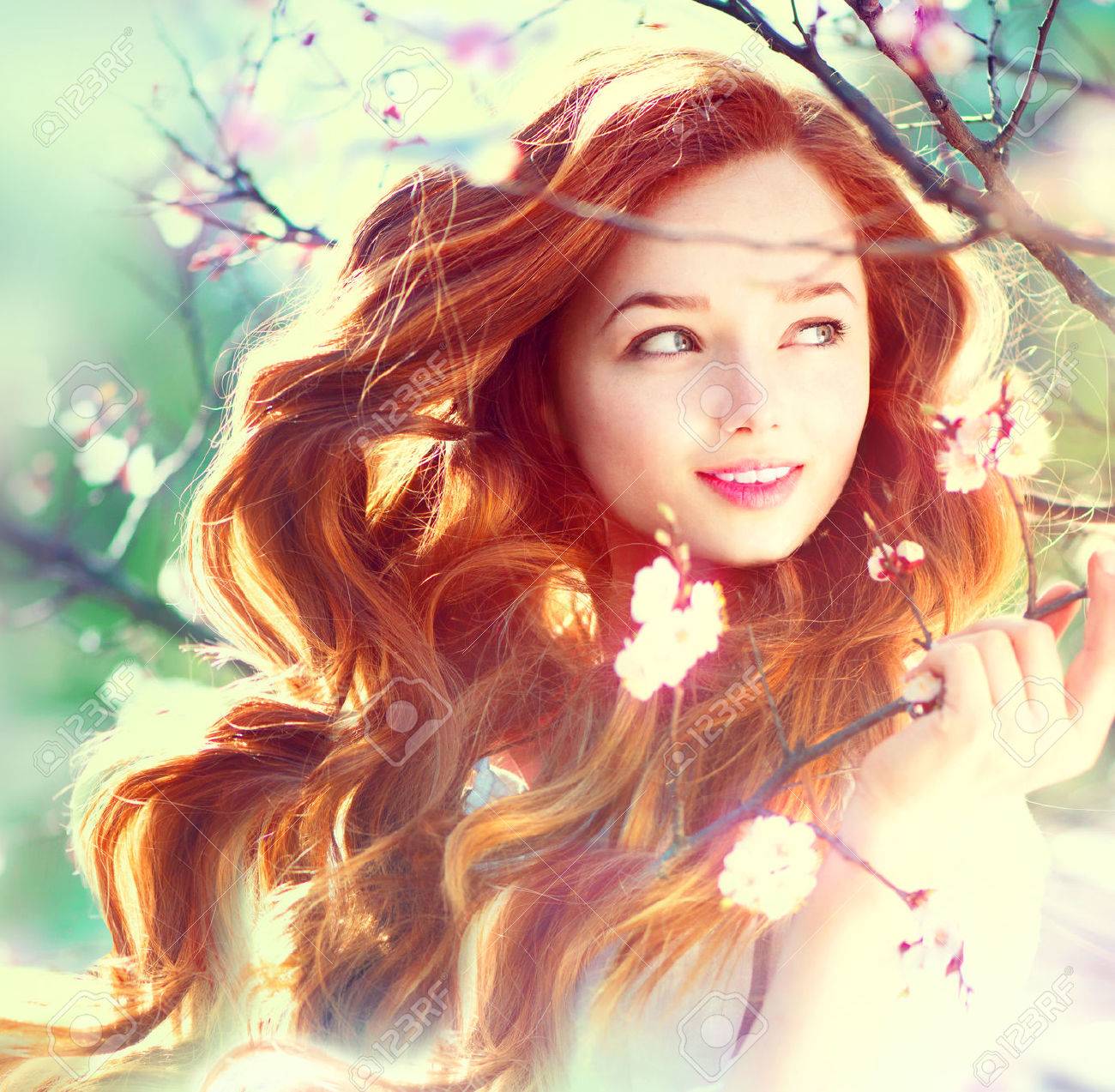 https://previews.123rf.com/images/subbotina/subbotina1404/subbotina140400098/27474748-Spring-beauty-girl-with-long-red-blowing-hair-outdoors-Stock-Photo.jpg