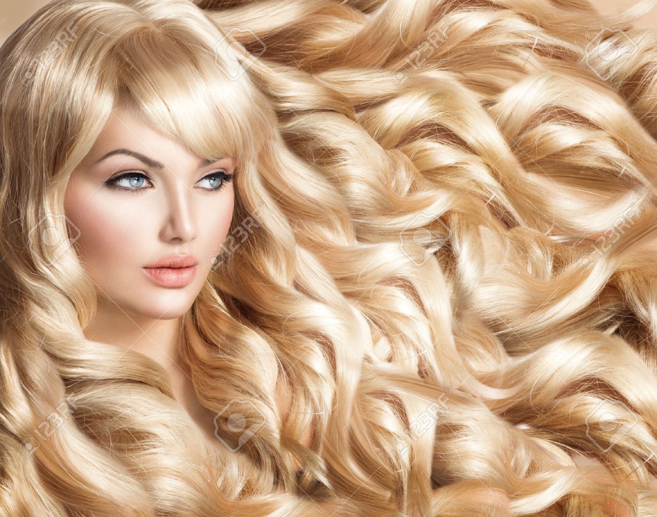 Beautiful Model Girl With Long Curly Blond Hair Stock Photo Picture