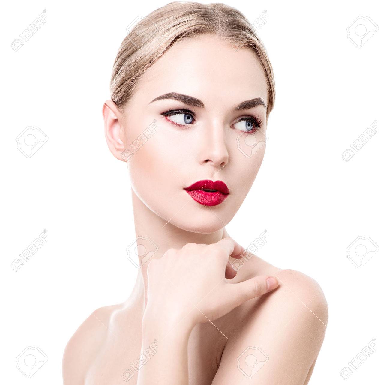 Foto de Young pretty woman on isilated background in white