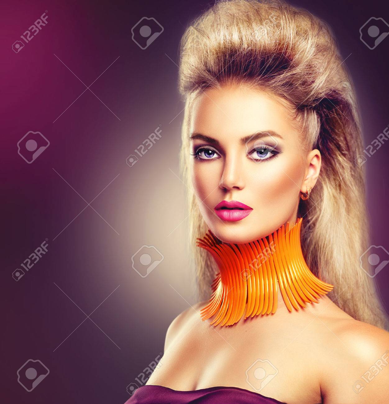 High Fashion Model Girl With Mohawk Hairstyle And Vivid Make