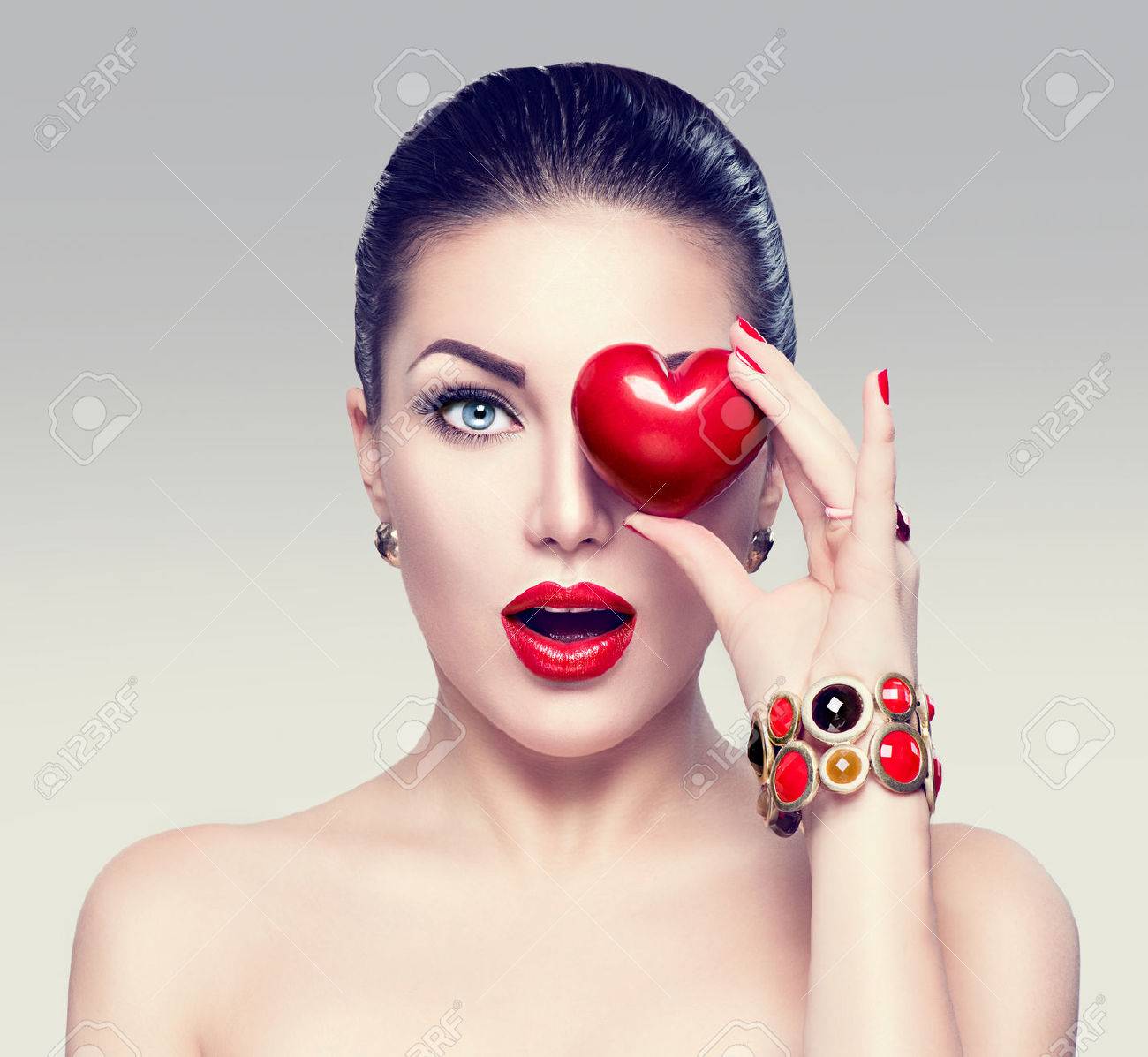 Fashion woman with red heart. Valentine's day art portrait - 51892247 Fashion woman with red heart. Valentine's day art portrait - 51892247