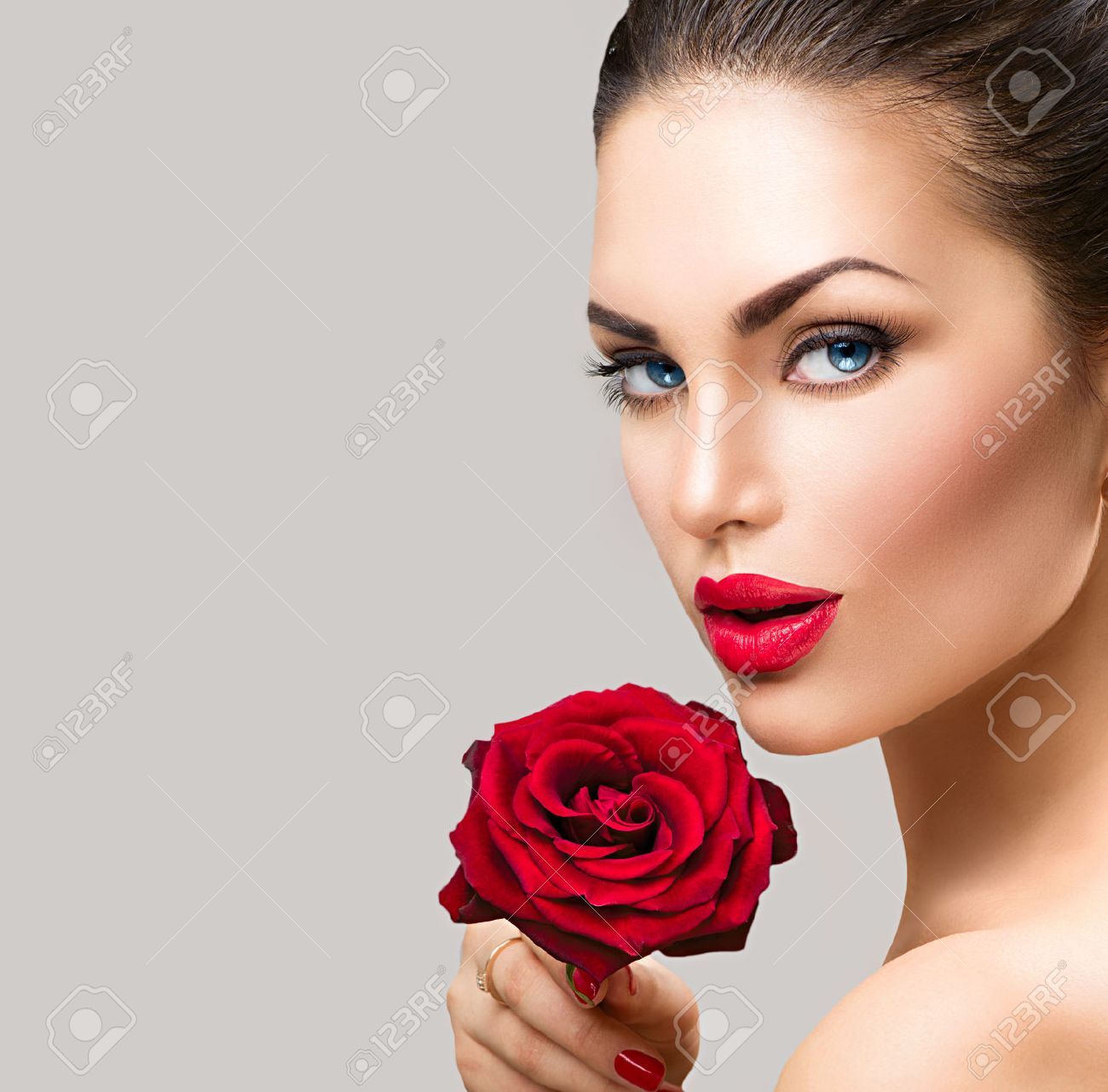 Beauty fashion model woman face. Portrait with red rose flower - 51755920 Beauty fashion model woman face. Portrait with red rose flower - 51755920