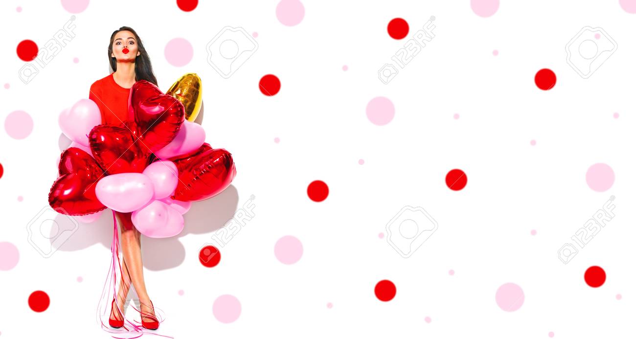 Valentine's Day. Joyful beauty girl with colorful air balloons having fun, isolated on white background. Full length portrait - 93476799 Valentine's Day. Joyful beauty girl with colorful air balloons having fun, isolated on white background. Full length portrait - 93476799